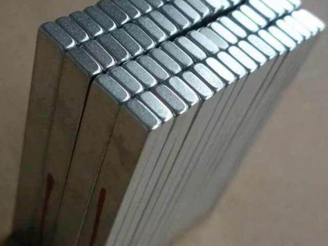 Double sided magnet